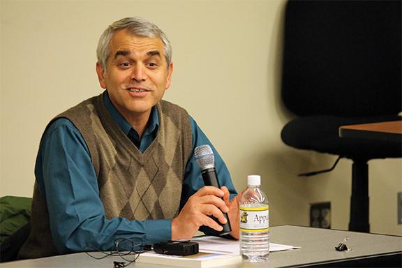 Professor in the Department of Computer Science Rahman Tashakkori spoke Tuesday night at a panel discussion based on the book ‘The Children of Abraham: Judaism, Christianity, Islam’ by F. E. Peters. Appalachian faculty briefly spoke about their experience with three monotheistic religions and took questions from the audience. Photo by Molly Cogburn  |  The Appalachian