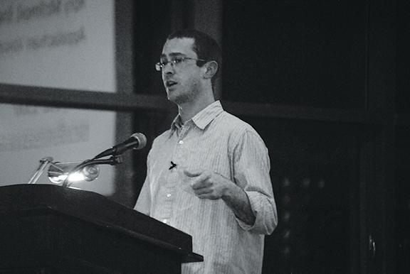 Rory McIlmoil, energy policy director for Appalachian Voices, gives a speech about renewable energy for the Renewable Energy Initiative’s Fall Forum. The forum was held in the Solarium in Plemmons Student Union on Monday. Photo by Nicole Debartolo  |  The Appalachian