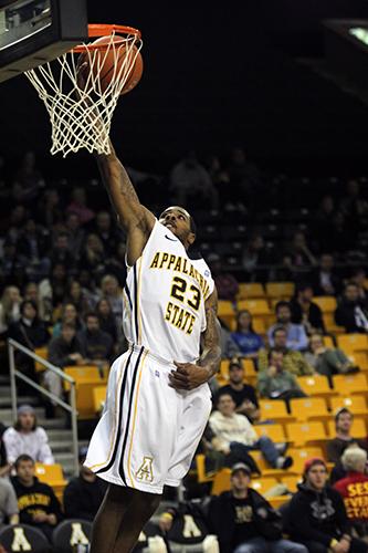 Mike Neal dunks the ball during Tuesday night's game against Lees-McRae. The Mountaineers slammed the Bobcats for a solid 91-63 win at home. Photo by Paul Heckert  |  The Appalachian