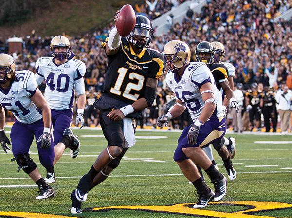 Quarterback Jamal Londry-Jackson runs for a touchdown during the Mountaineers’ 46-14 victory over Western Carolina University during the 2011 season. App State will face Western for their last SoCon game Saturday, looking to keep the Old Mountain Jug for the ninth consecutive year. Photo by Adam Jennings  |  The Appalachian