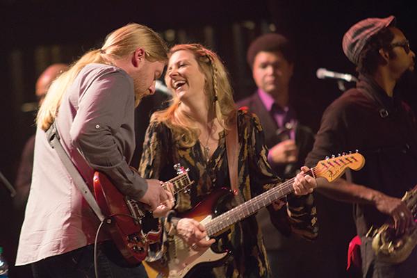 Tedeschi Trucks Band frontman Derek Trucks (left) and frontwoman Susan Tedeschi (right) pumped up the jams to a sold-out crowd Friday night at the Schaefer Center for the Performing Arts. The blues-rock duo formed the band in 2010 after they married and put their solo projects on hold to tour and record together. Photo by Paul Heckert  |  The Appalachian