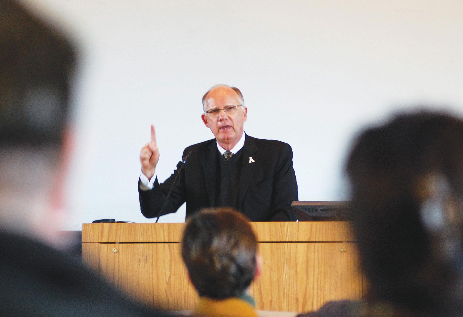 Chancellor Kenneth Peacock speaks to Appalachian State University Faculty Senate during their meeting Friday. Peacock addressed the university's new mission statement and asked for support in defense of the statement, which is currently facing opposition by the UNC Board of Governors. Photo by Dana Clarke | The Appalachian