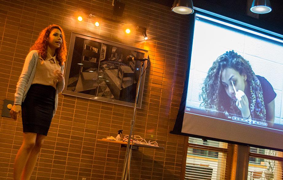 Junior biology major Angie Vasquez-Espinal discusses make-up application at Monday night's Hair Affair that took place in The Whitewater Cafe. The program was presented by Ladies Elite. Photo by Paul Heckert  | The Appalachian