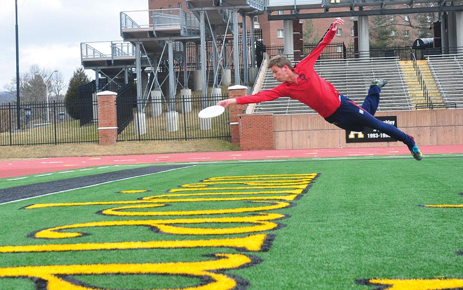 Former Appalachian State Men’s Ultimate Frisbee captain Justin Allen lays out for a pass while practicing. Allen will join the New York Empire Ultimate team. Photo by Joey Johnson  |  The Appalachian