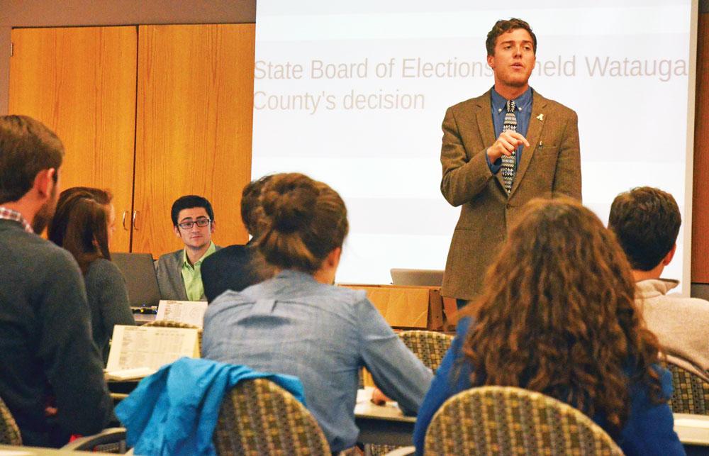 SGA president Dylan Russell discusses a bill that will put students on Boone Town Council committees during Tuesday’s SGA meeting. The bill was approved with 46 out of 47 votes. Photo by Maggie Cozens | The Appalachian
