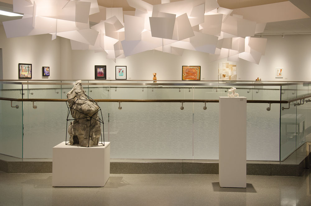 Sculptures are displayed in front of the railing on the second level of the Catherine J. Smith Gallery as part of the Art Expo. The Art Expo is a juried exhibit that is open to any student currently enrolled in an Appalachian State University course. Photo by Kim Reynolds | The Appalachian