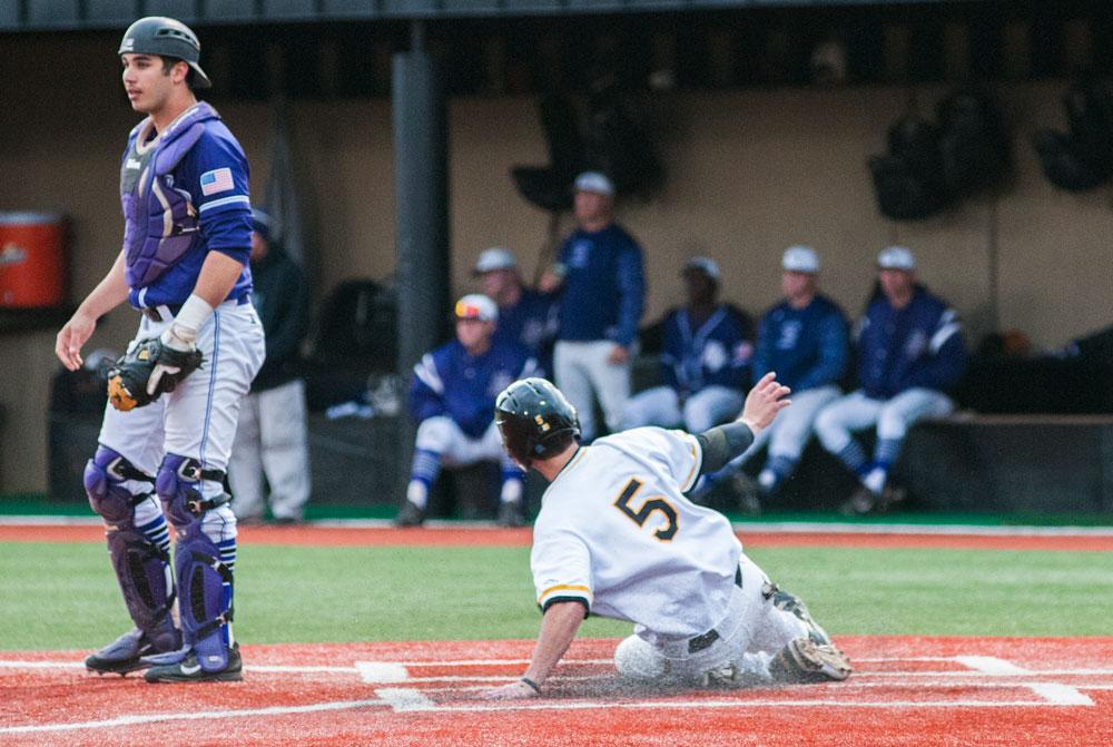 Senior third baseman William Head slides home Tuesday night during the Mountaineers loss to High Point University. Photo by Morgan Cook  |  The Appalachian